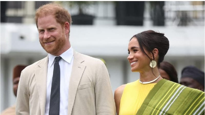 Harry dan Meghan saat berada di Nigeria pada Mei lalu. (Instagram/@meghan.markle.official)